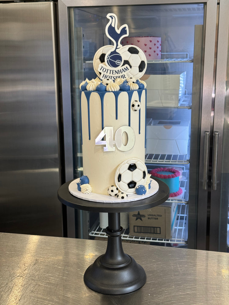 5" x 4 layer Soccer themed cake + edible prints + acrylic silver front topper + fondant soccer ball details + drips + icing piping on top + sprinkles