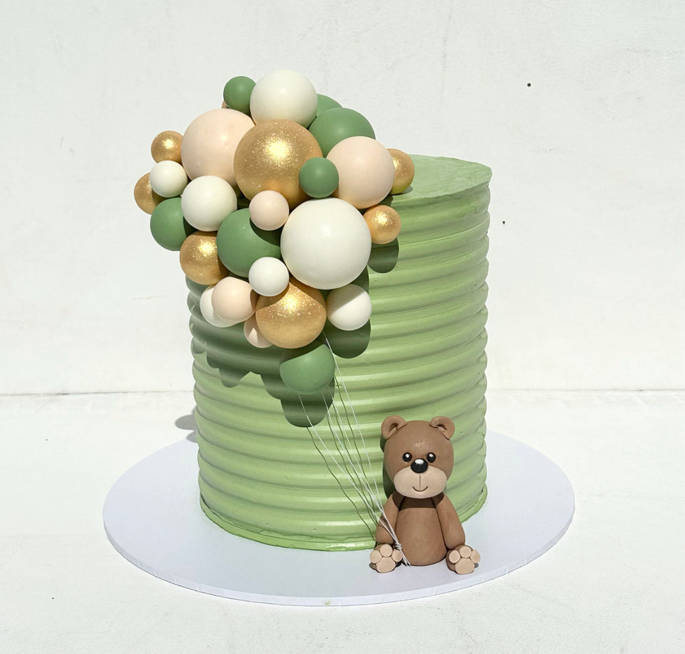Fondant teddy figurine with choc spheres & textured base